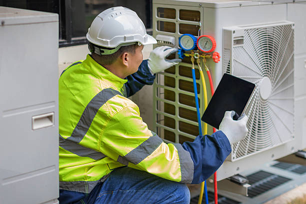 Professional Heat Pump Repair technician working in Sycamore, PA